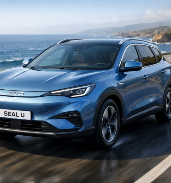 BYD Seal U Electric SUV showcasing ocean-inspired design while driving.
